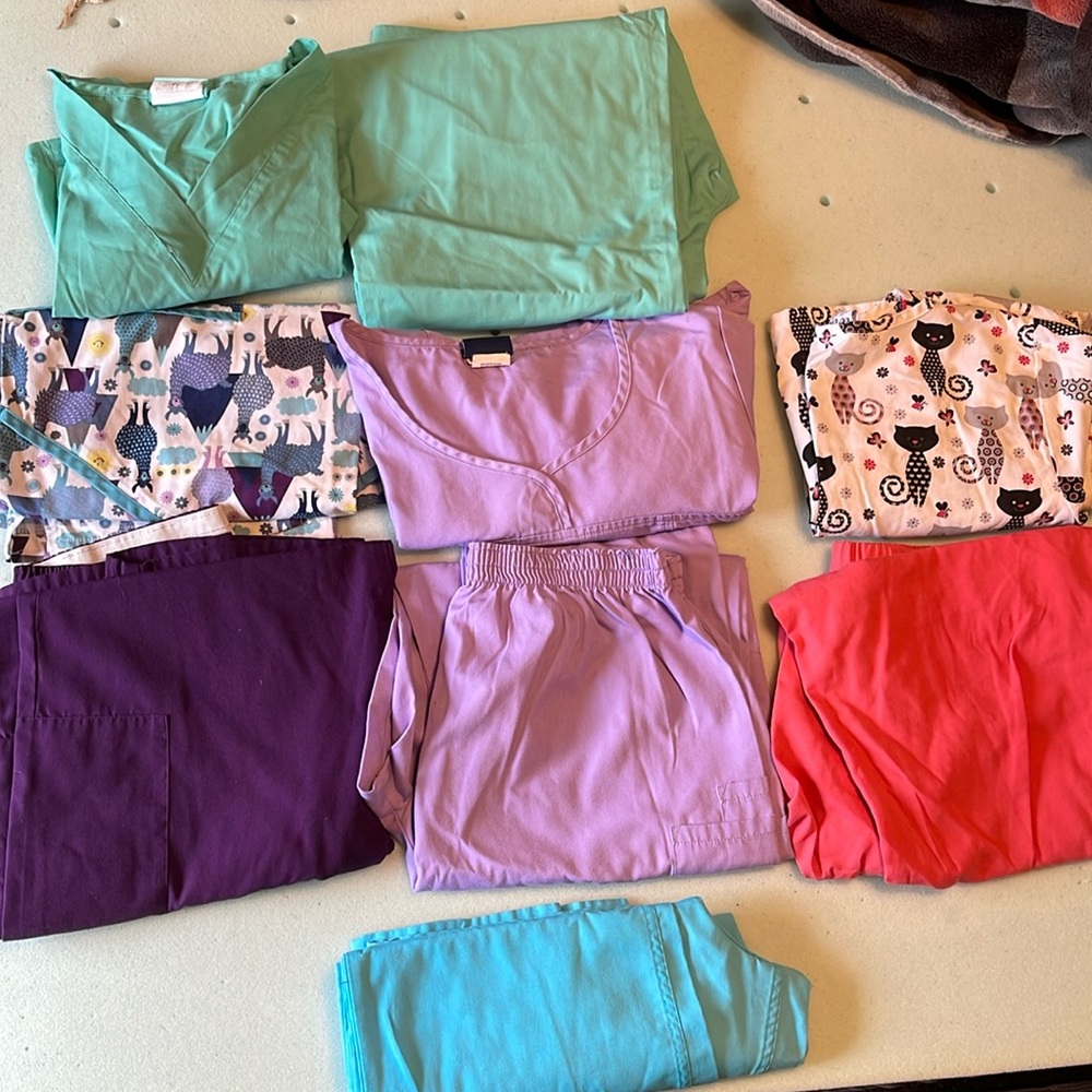 FOUR SETS of scrubs (Top and bottom) + One extra scrub pant (Baby Blue)